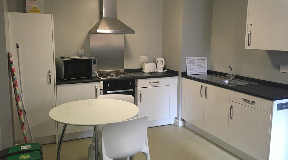 Kitchen area in a Deluxe Studio at Crown Place