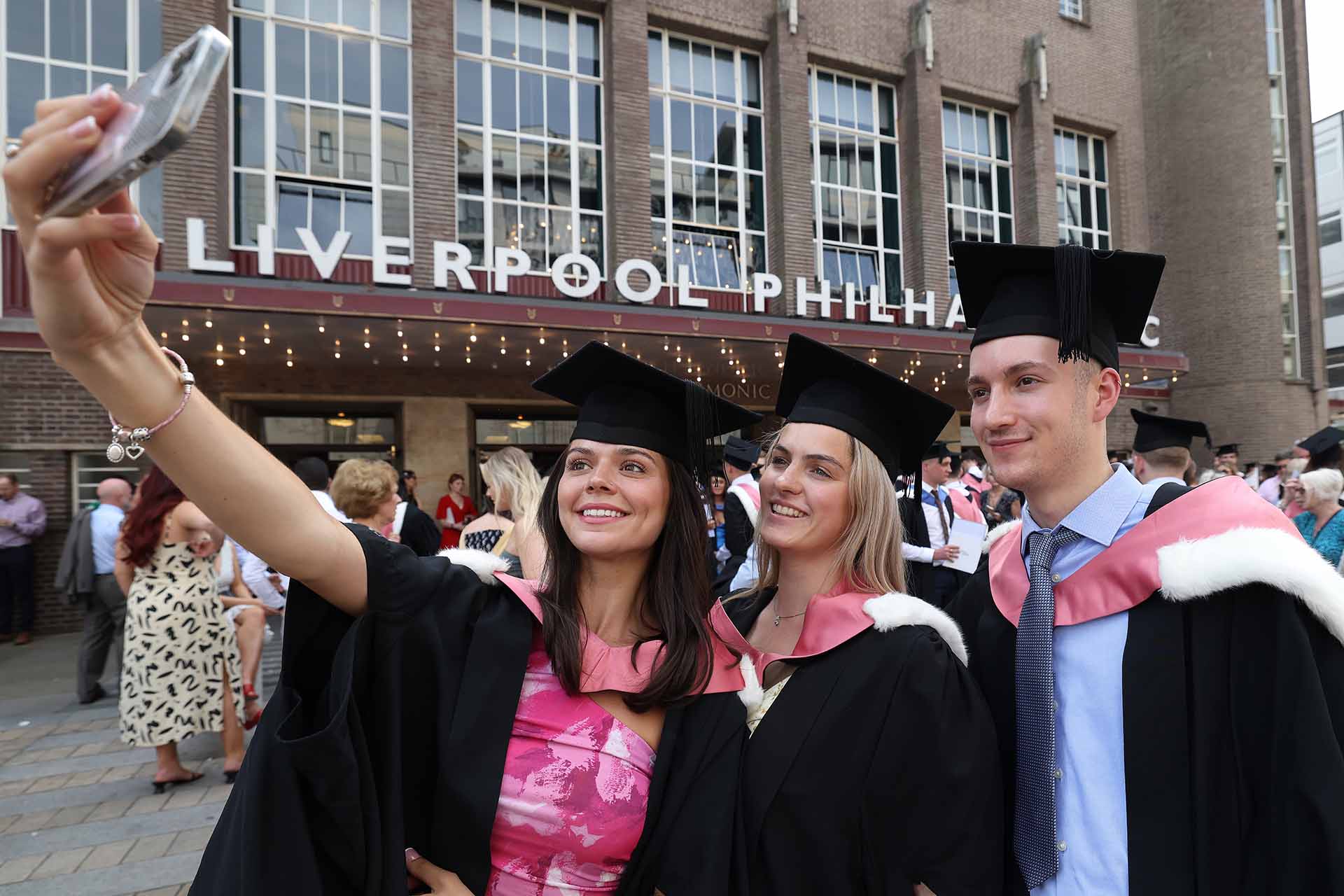 Group of graduates taking a selfie