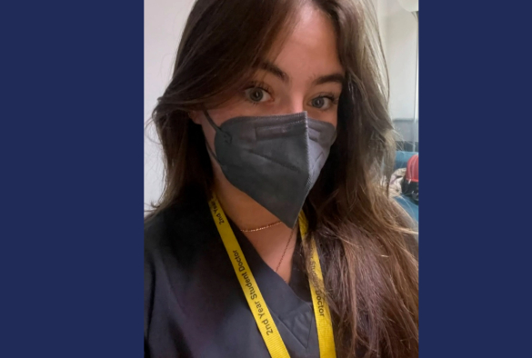 Medicine and Surgery student Rachel wearing PPE mask and medical student lanyard