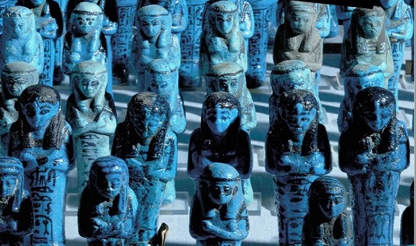 blue and black individual ancient statues. Some statues look Ancient Egyptian in style 