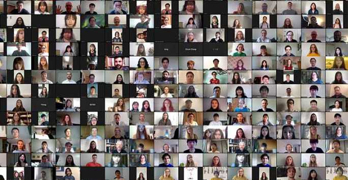 Head shots of several hundred people on a zoom call.