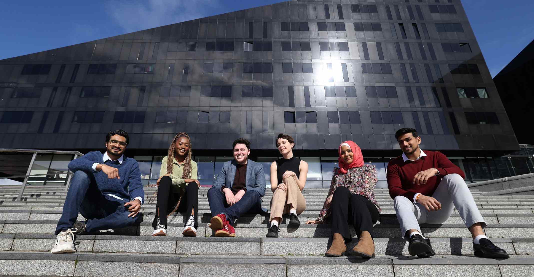 Students sitting on stairs