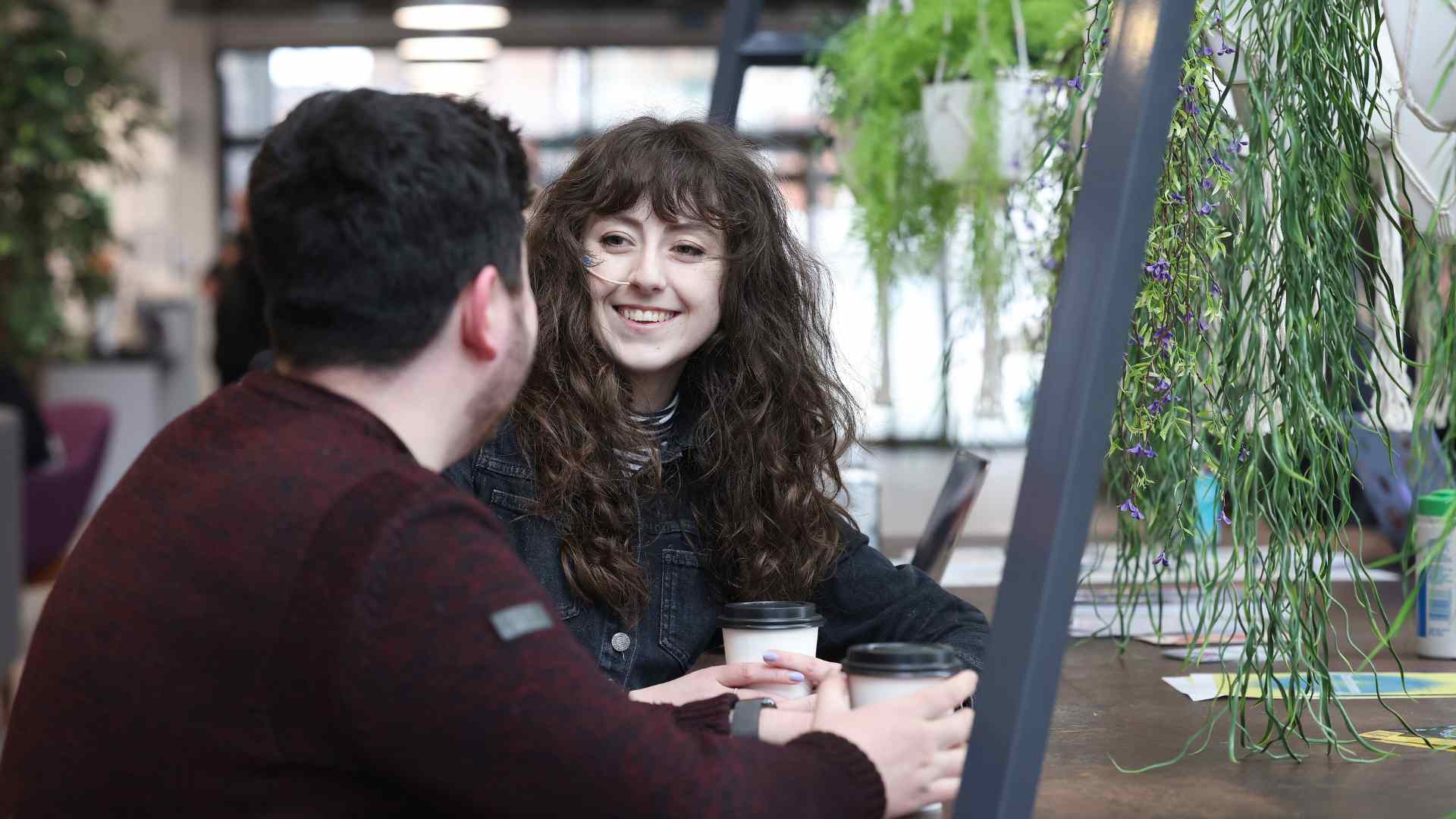 students talking in a cafe