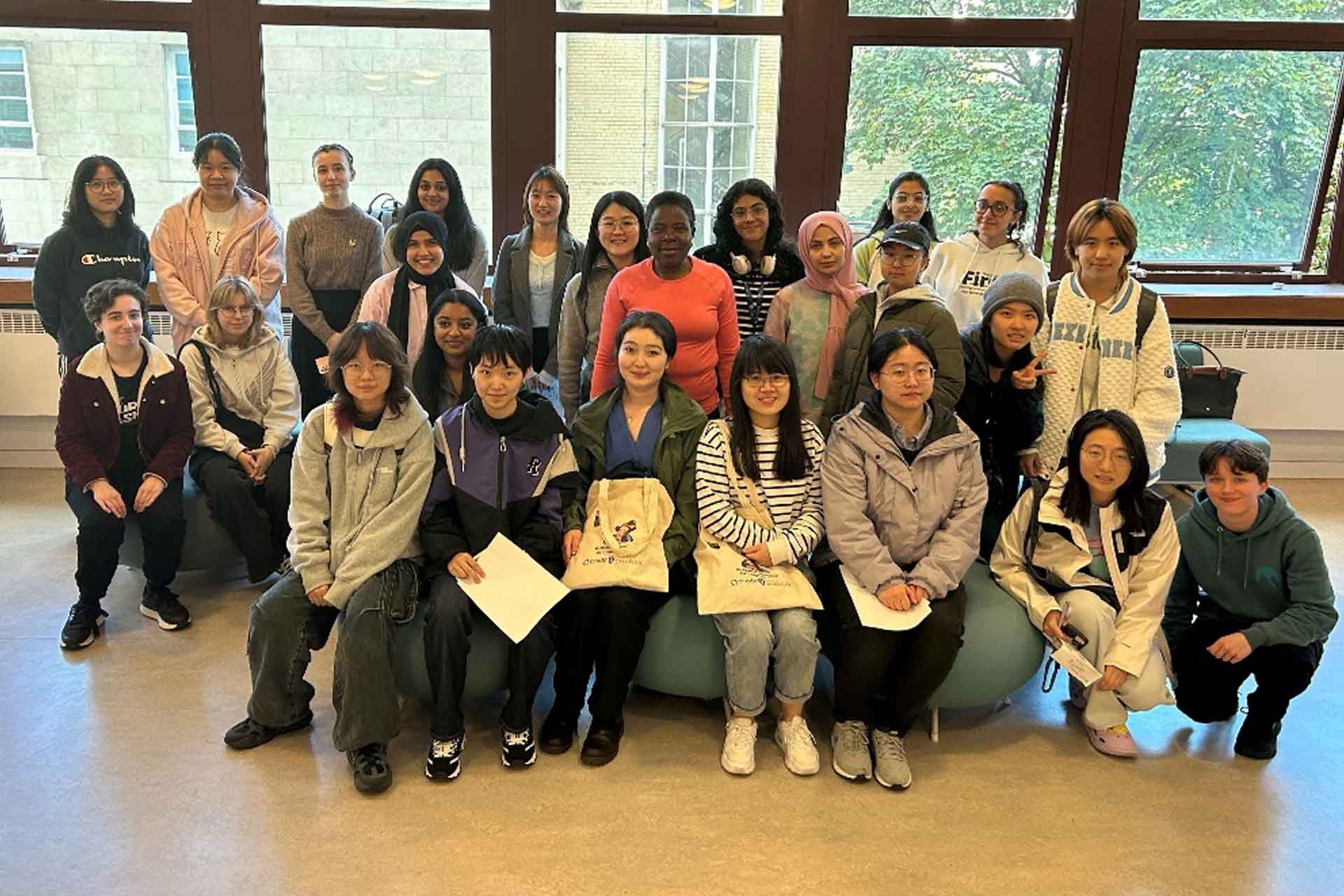 A group photo of a group of students attending the EEECS Female and Non-Binary Network