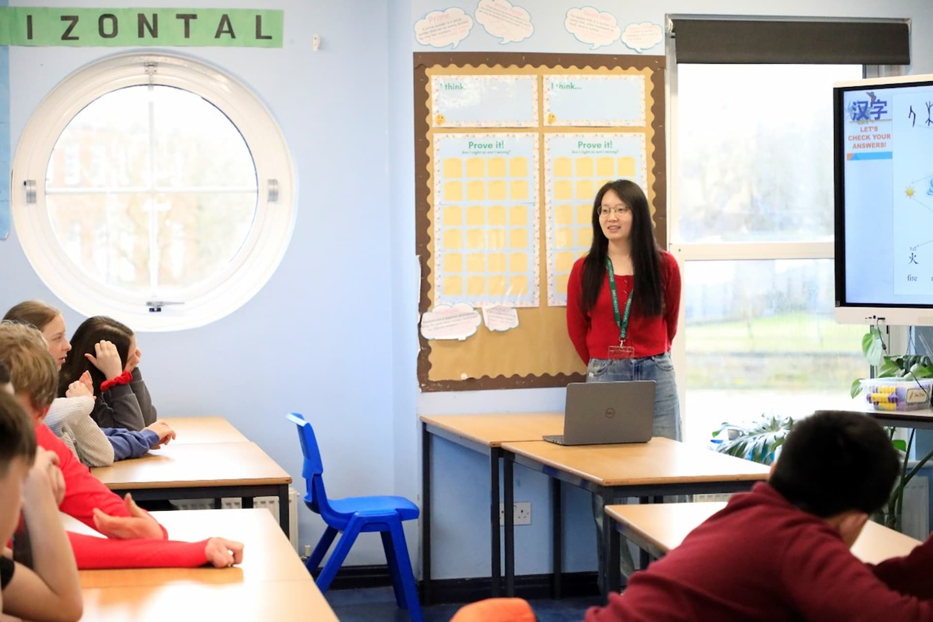 LCI Mandarin Teacher in a school classroom.