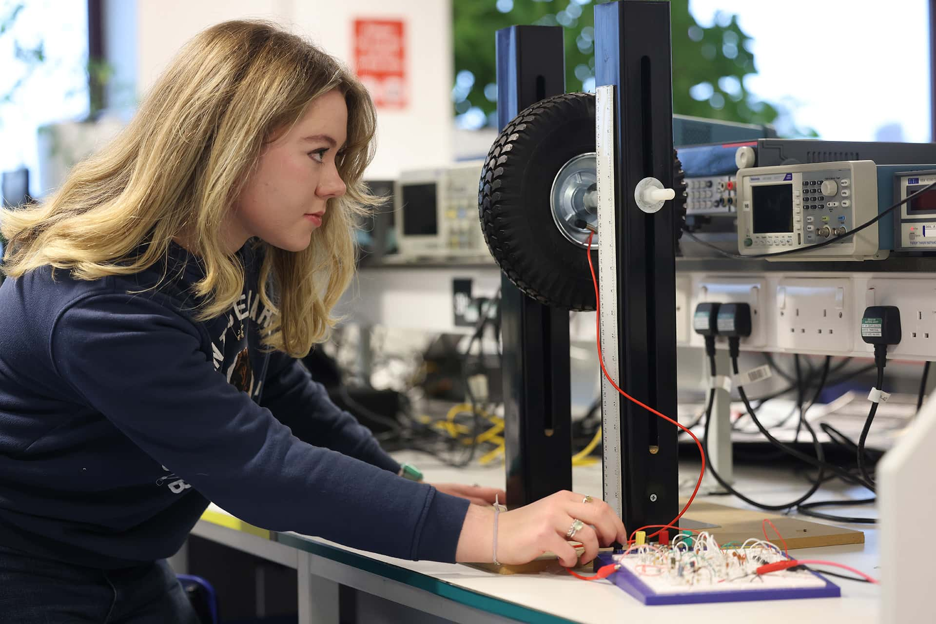 Student working on wheel electronics