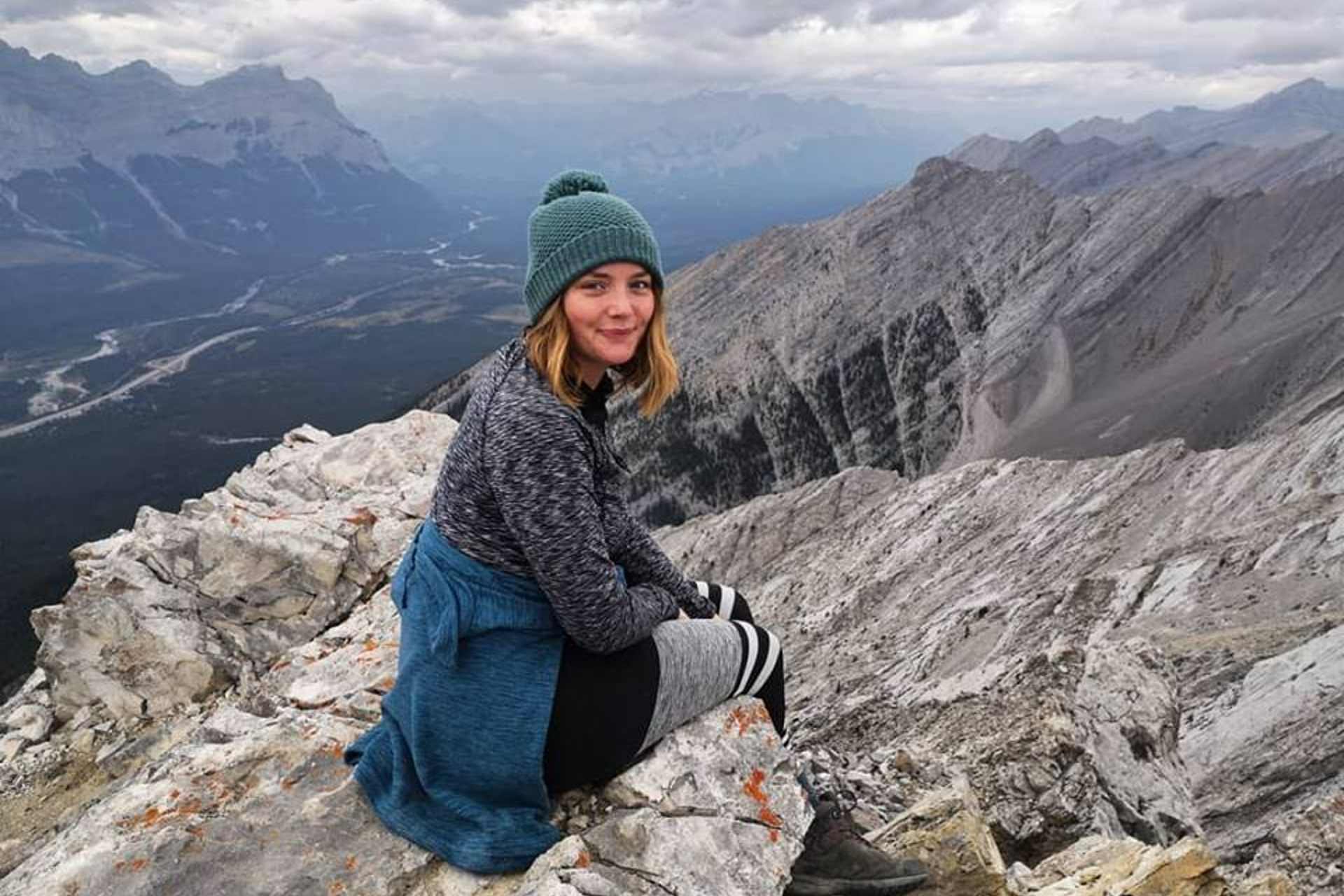 A student on a mountain top in Calgary, Canada.