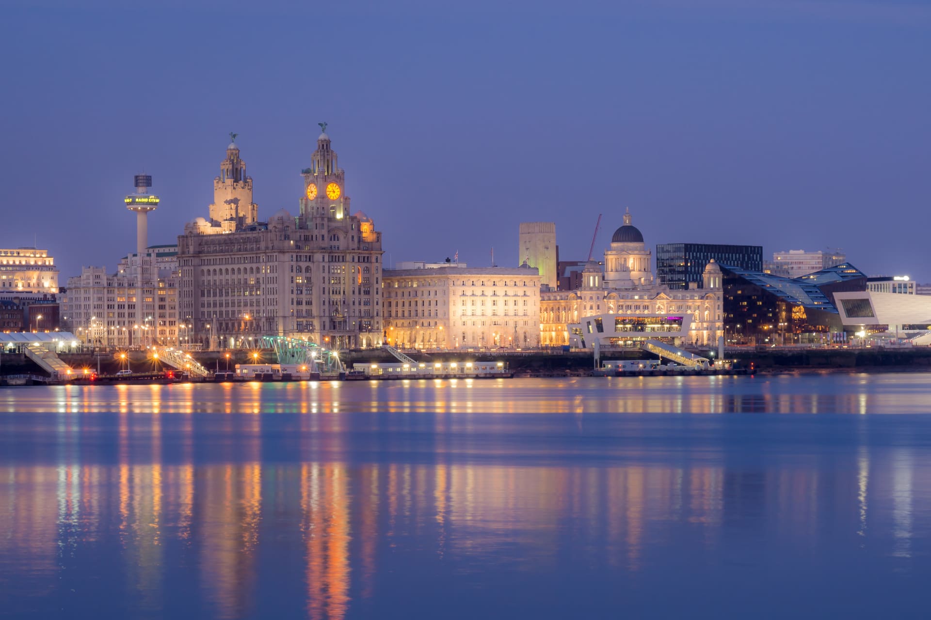 The Liverpool water front illuminated at dusk.