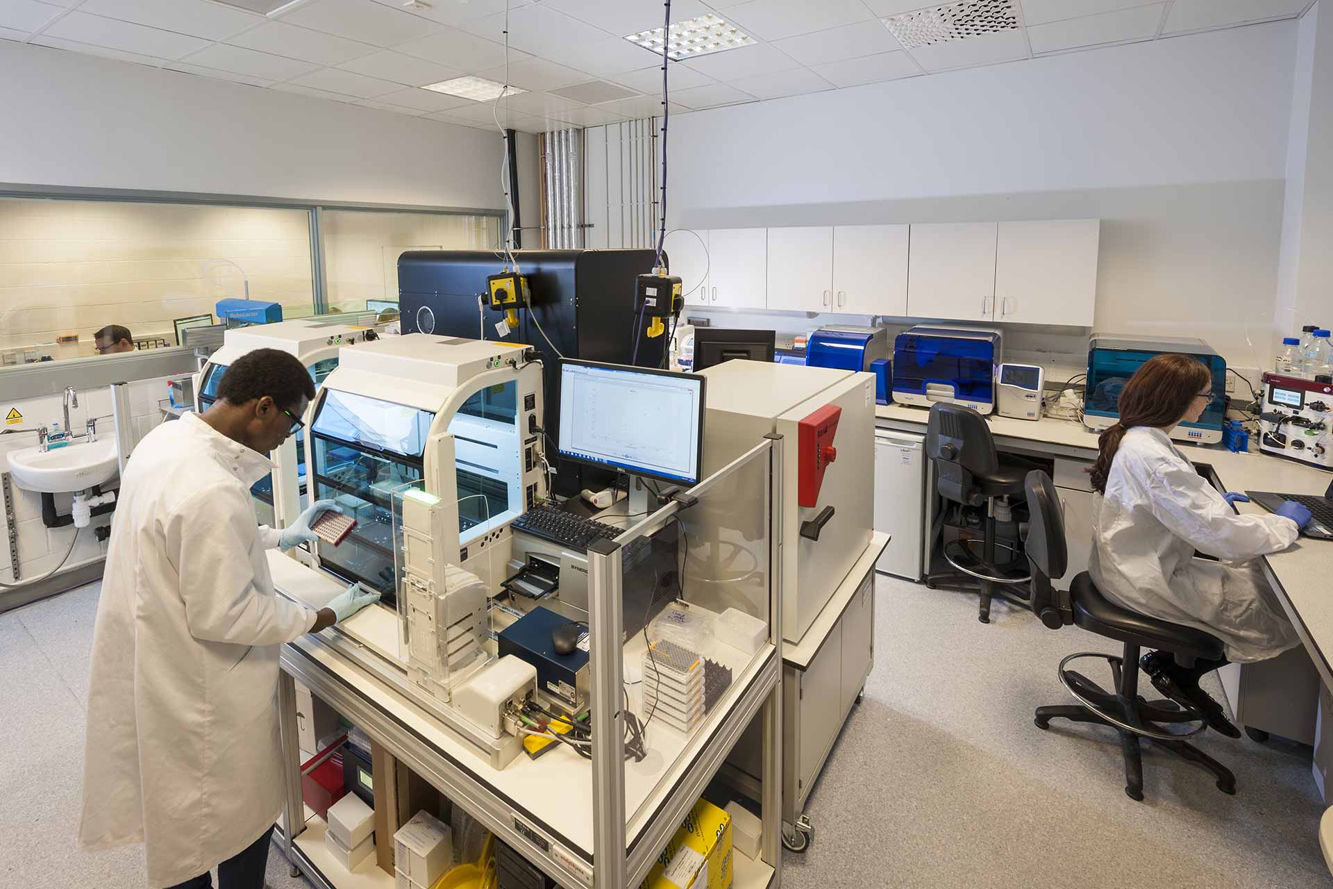 Researchers working in a lab setting at the University of Liverpool