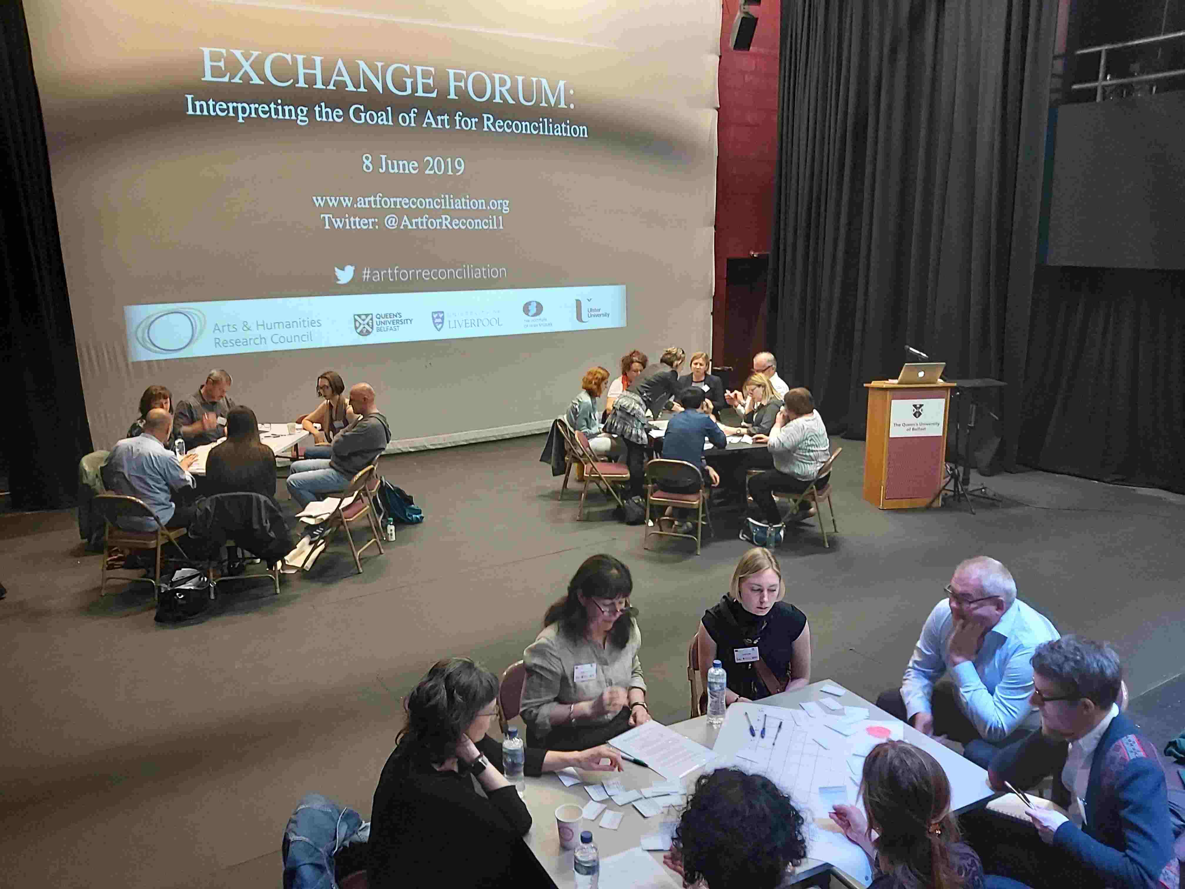 thumbnail photo from Exchange Forum: 3 groups of people sitting around round tables.
