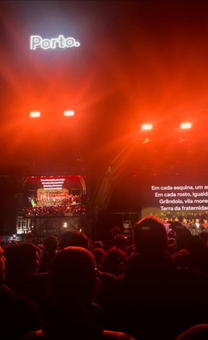 Bright red lights with a Porto sign