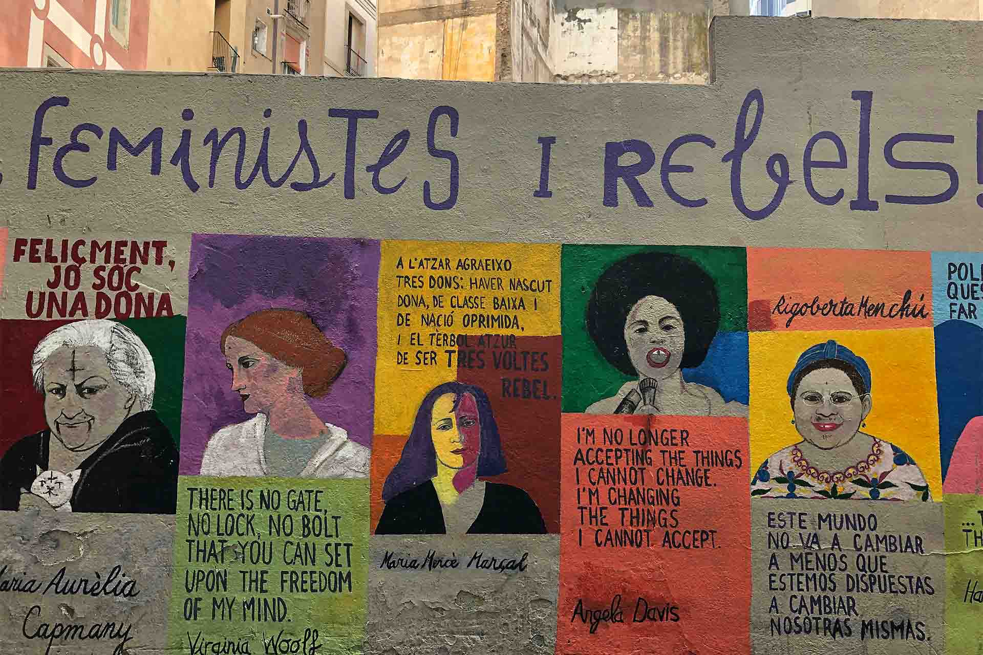 Feminist artwork on a wall.