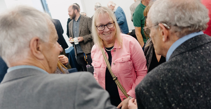 Guests at the event talking to one another