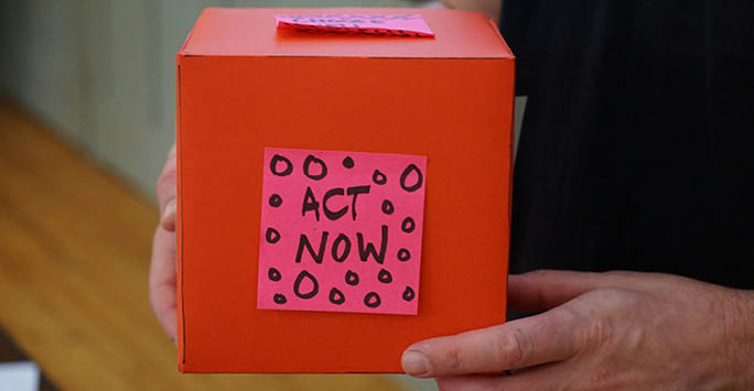 A red box with the text Act Now on it.