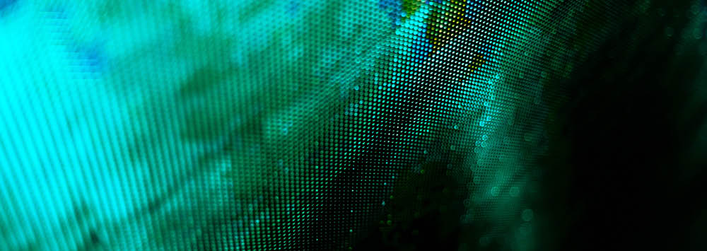 A close up photo of a digital screen with black and green pixels