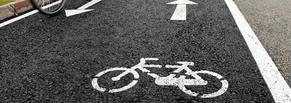 Road marking of bike on pavement.