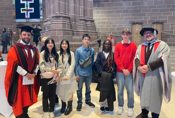 A group of Liverpool Law School students and staff inside the Liverpool Cathedral.