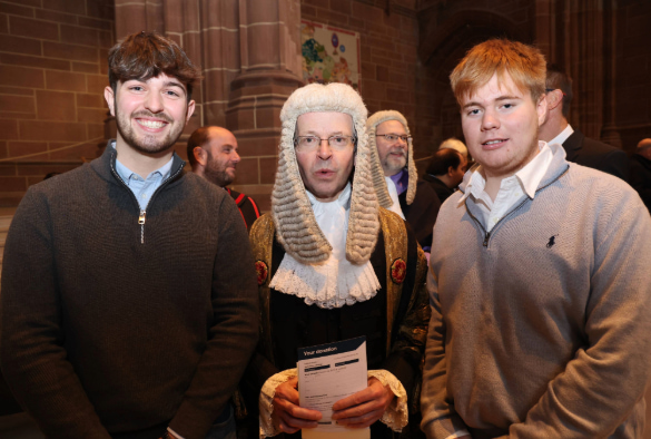 Two Liverpool Law School students with Mr Justice Fancourt.