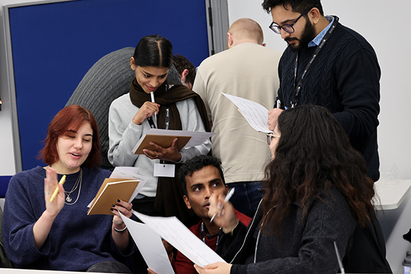 A group of students in dialogue.