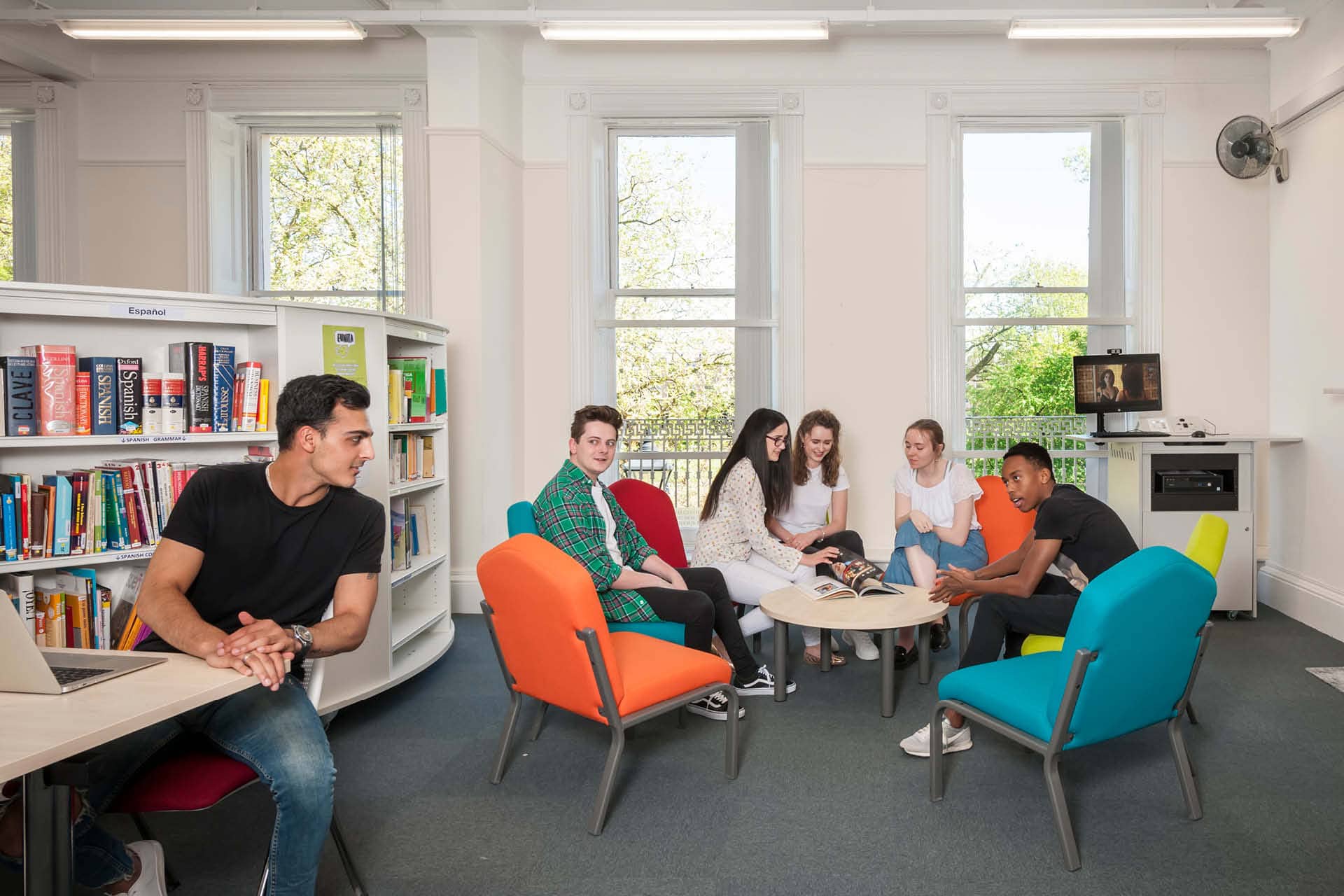 students sat in a library