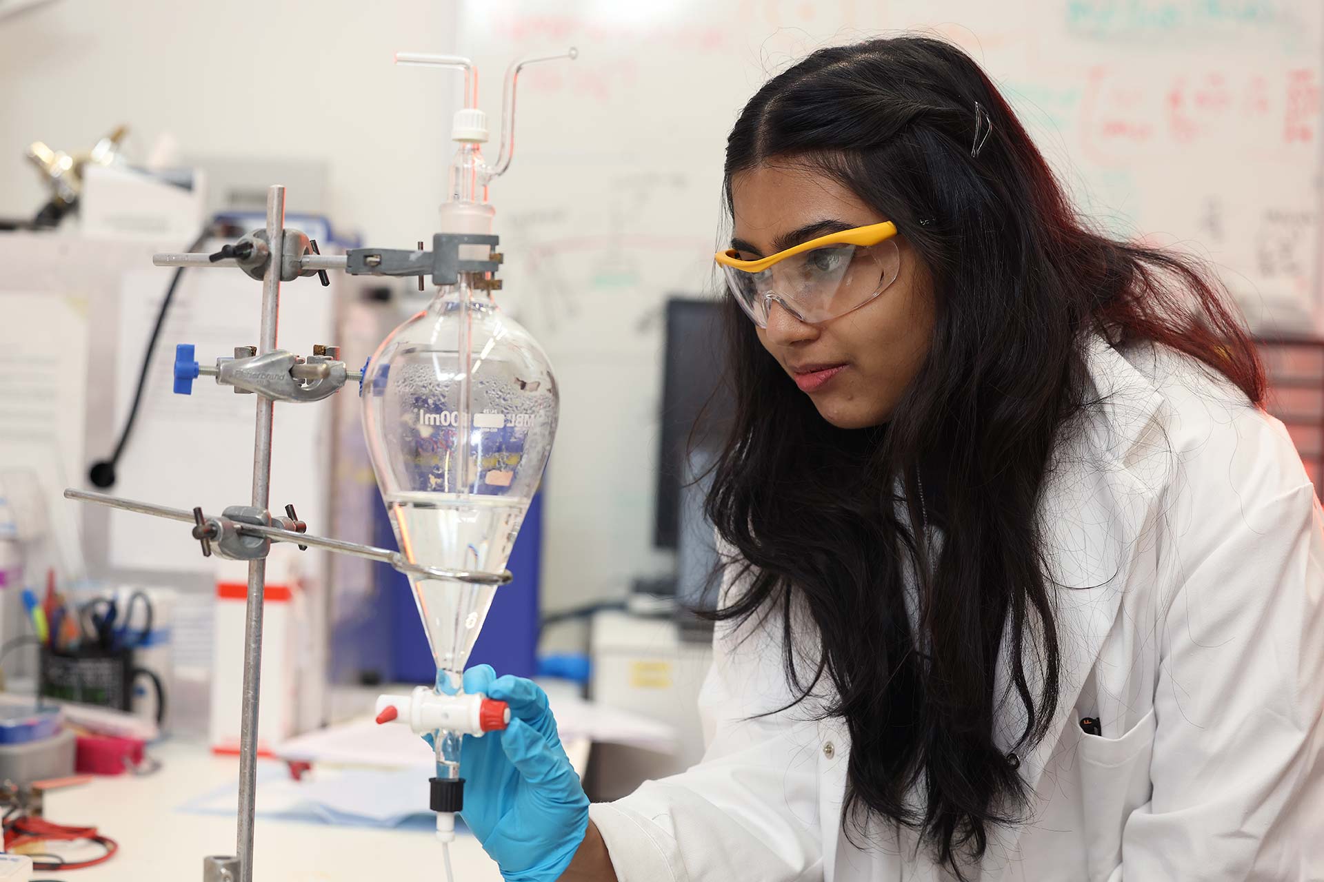 Student conducting an experiment in a laboratory at the University of Liverpool