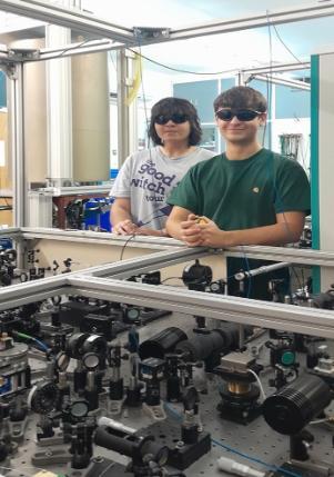 Lennox and Chetan in the atom interferometry lab