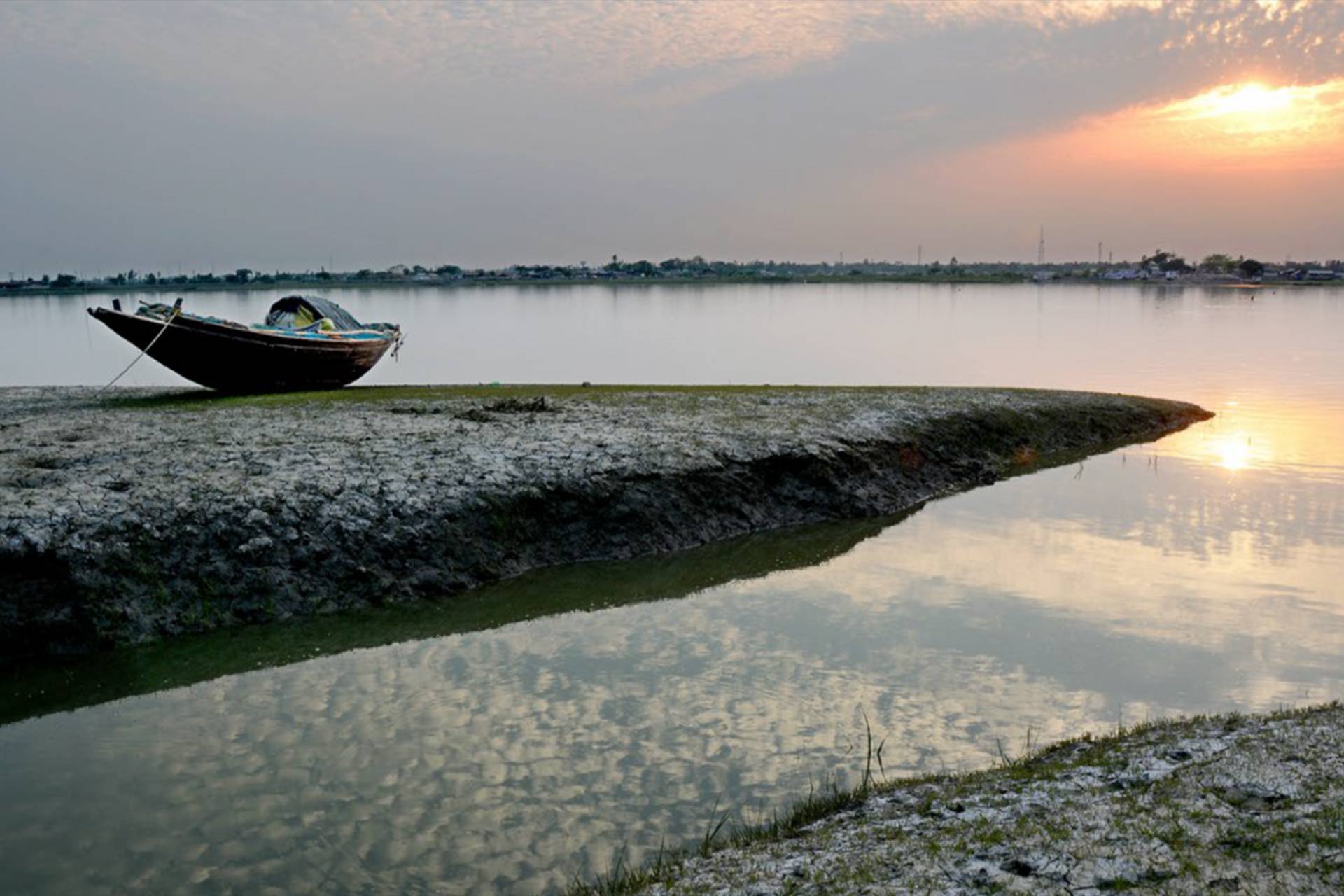 A small boat near a coastline