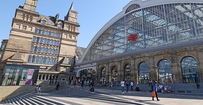 Photograph of the main entrance to Liverpool Lime Street Station on a sunny day, by Gareth Jones
