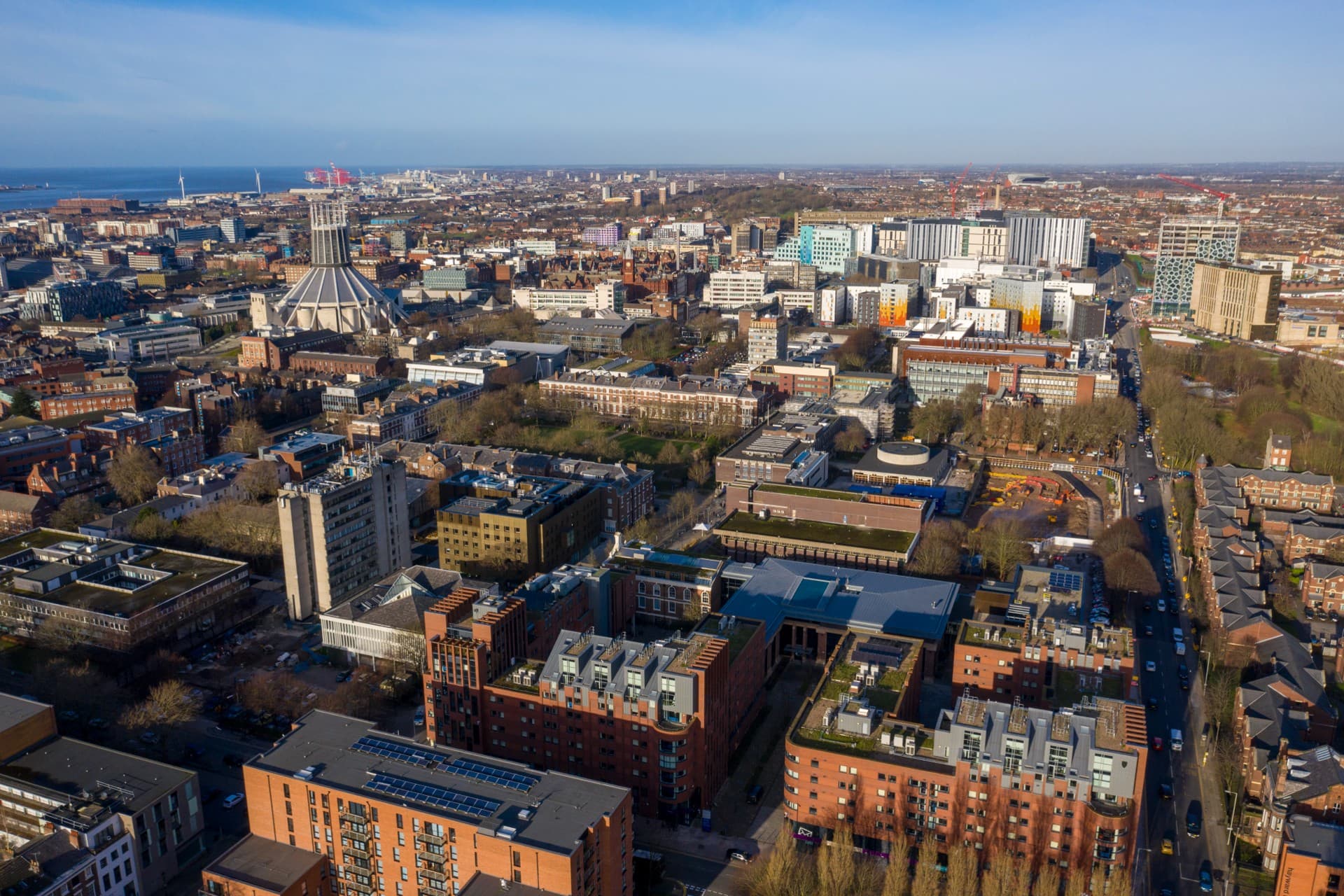 An aerial view of the University of Liverpool's city centre campus, with the Metropolitan Cathedral and other buildings in view.