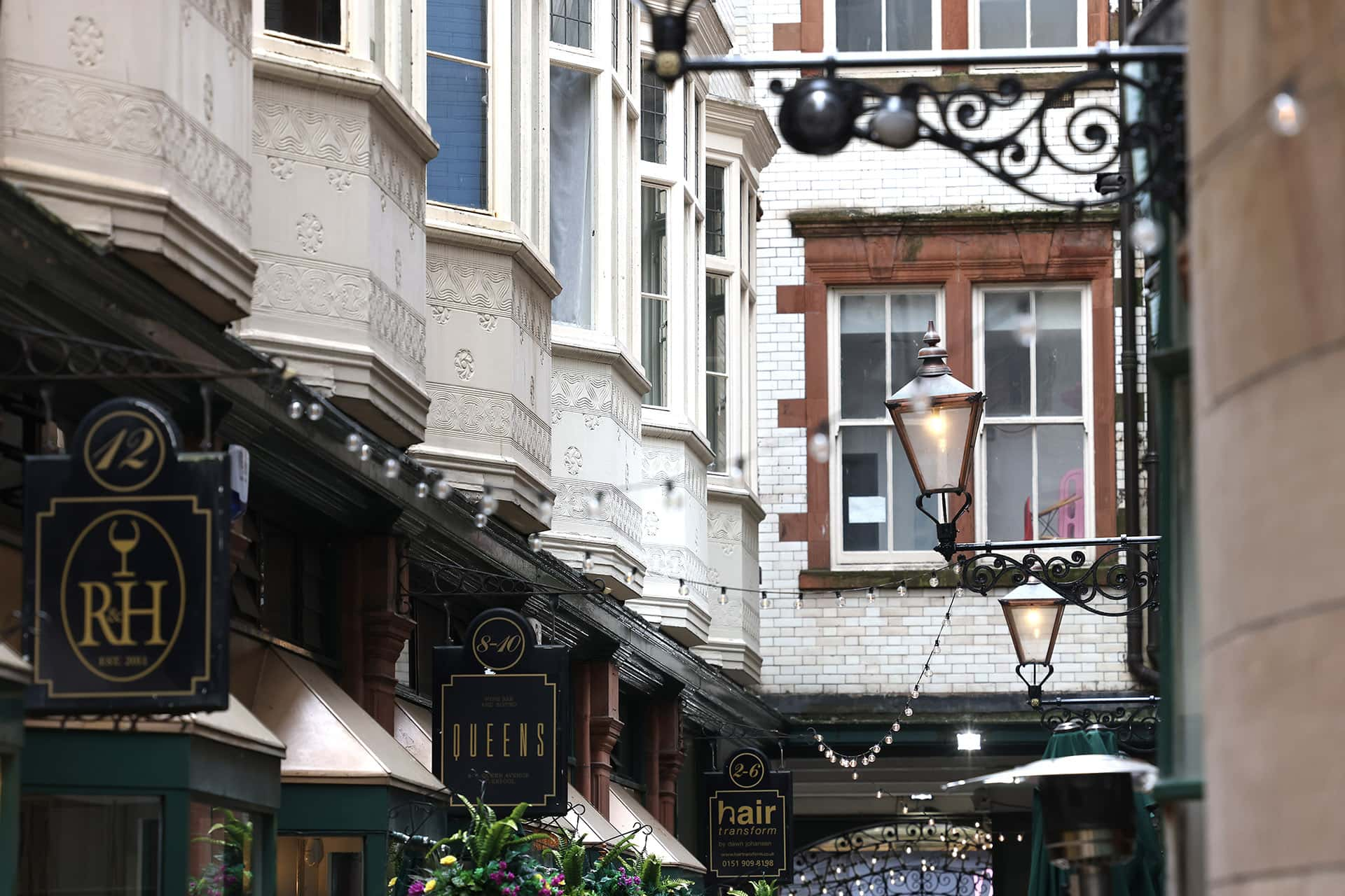 Shopping arcade with independent shops on Queen Avenue