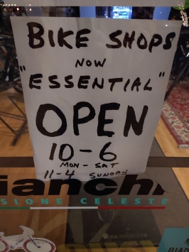 A sign in a shop window stating 