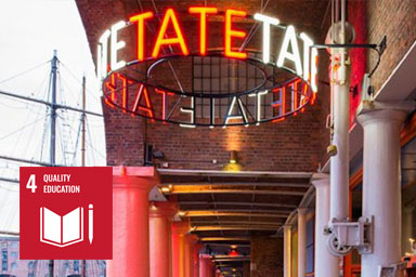 Neon name sign outside Tate Liverpool