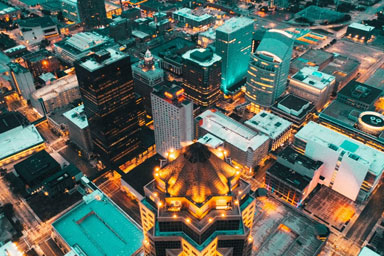 An aerial view of a city scene at night