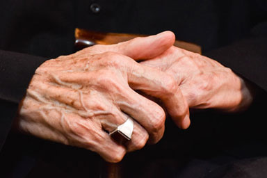 A pair of hands belonging to an older person