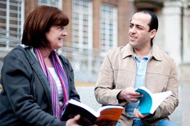 Two mature students chatting