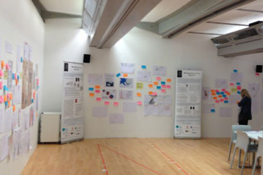 Gallery walls covered in notes and documents