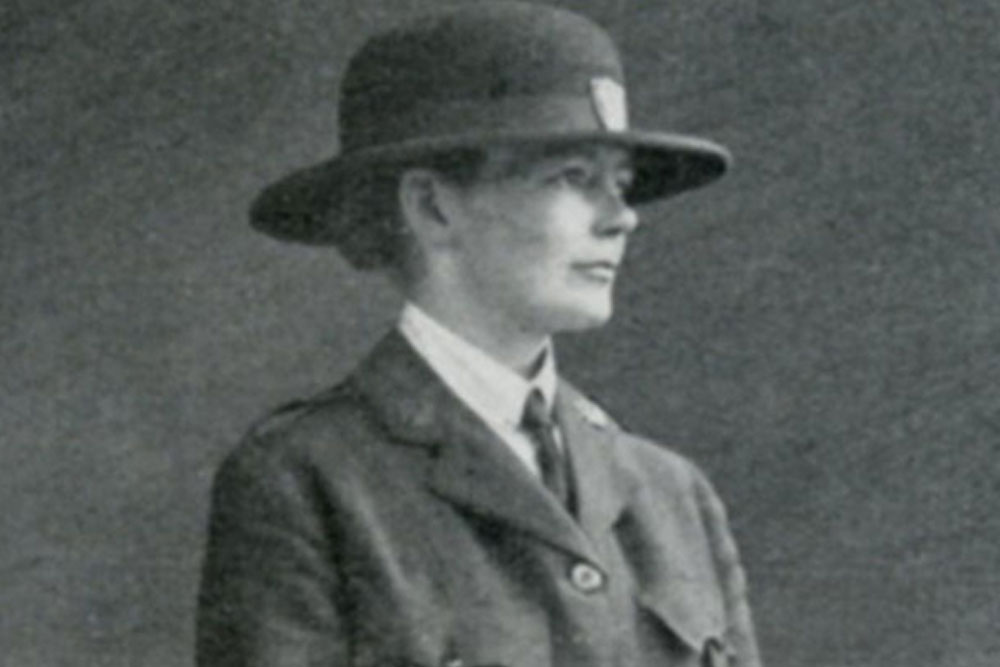 A black and white photo Dorothy Peto in police uniform