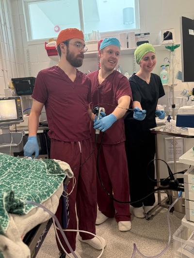 A SATH intern does endoscopy with a senior medicine clinician and a student