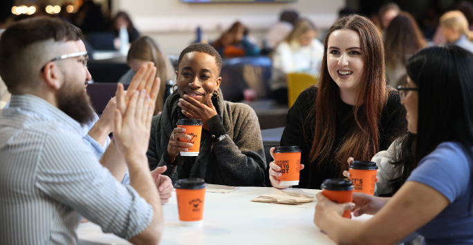 Students enjoying a coffee together