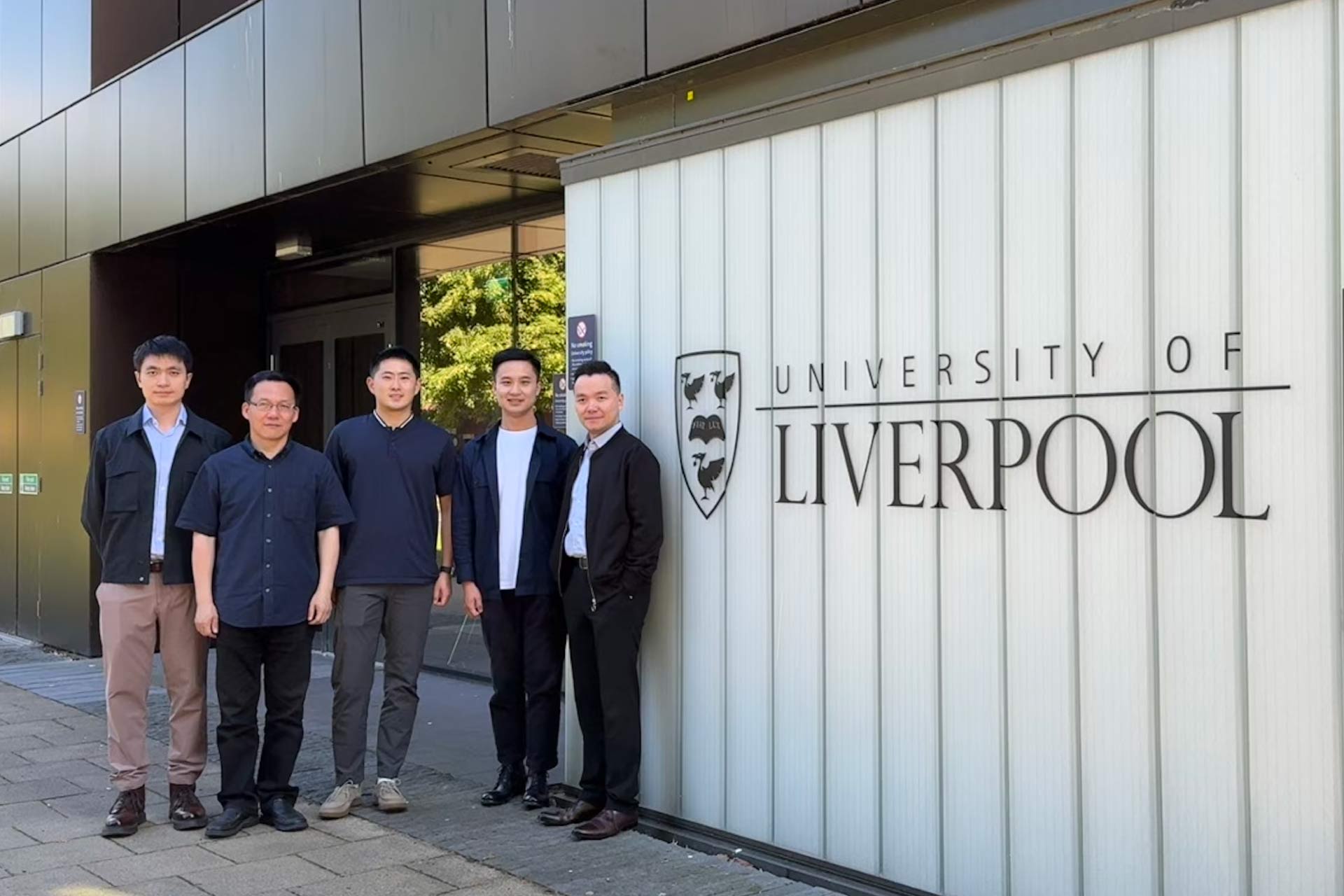 Members of the Operation and Supply Chain Management Group and academics from Shanghai Jiao Tong University pose together outside the University of Liverpool Management School. This is part of a research collaboration for the project  “Green Design for Circular Supply Chains in Used Textile Recycling
