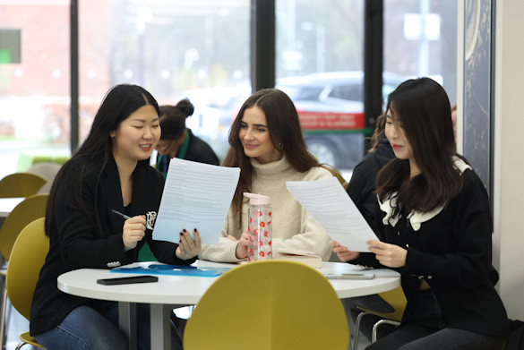 Students working together around a table