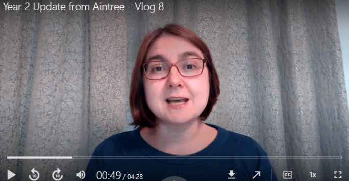 Woman talking to camera wearing glasses