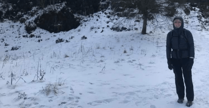 woman student walking in the snow