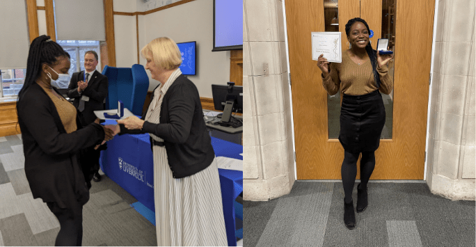 a student collects an award and poses with her certificate and medal