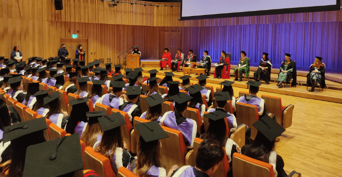 Graduate speaker Natasha Varshney addresses the audience