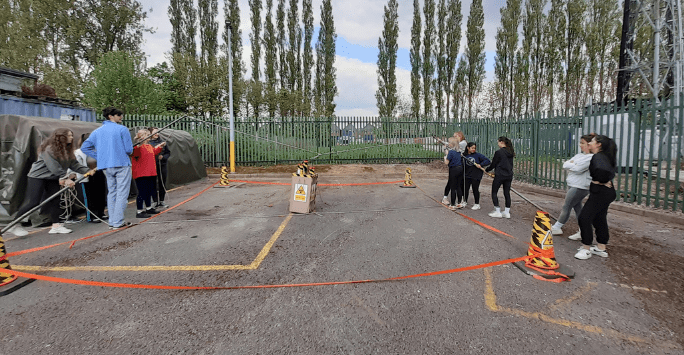 students participate in an army training activity