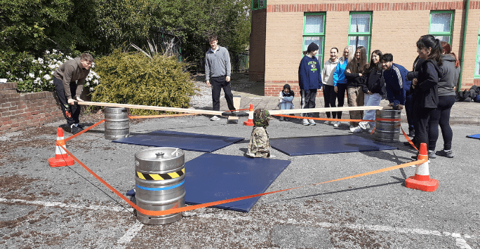 students participate in an army training activity