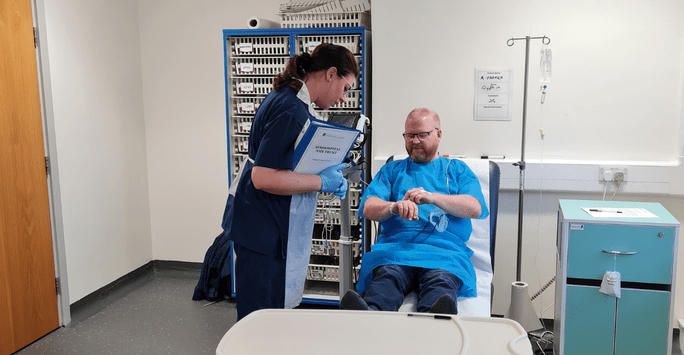 a student doctor works with a simulated patient actor in a clinical scenario