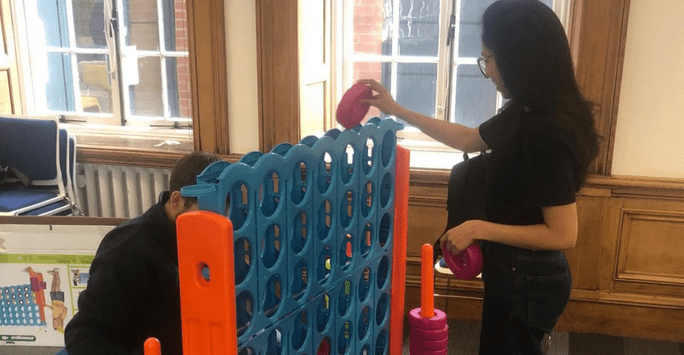 students play a giant game of connect 4