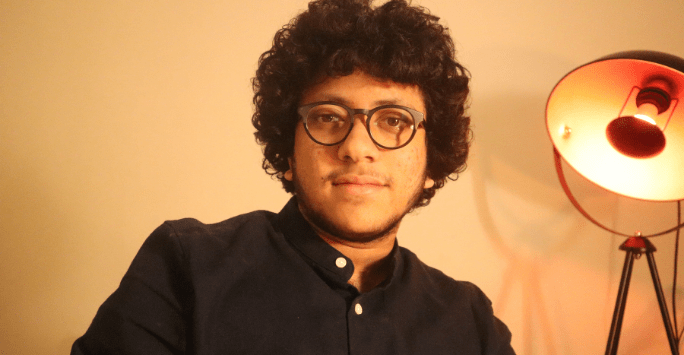 man in black shirt with light feature